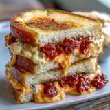 Classic Southern tea sandwiches filled with homemade pimento cheese spread, ideal for elegant entertaining or casual brunches.  