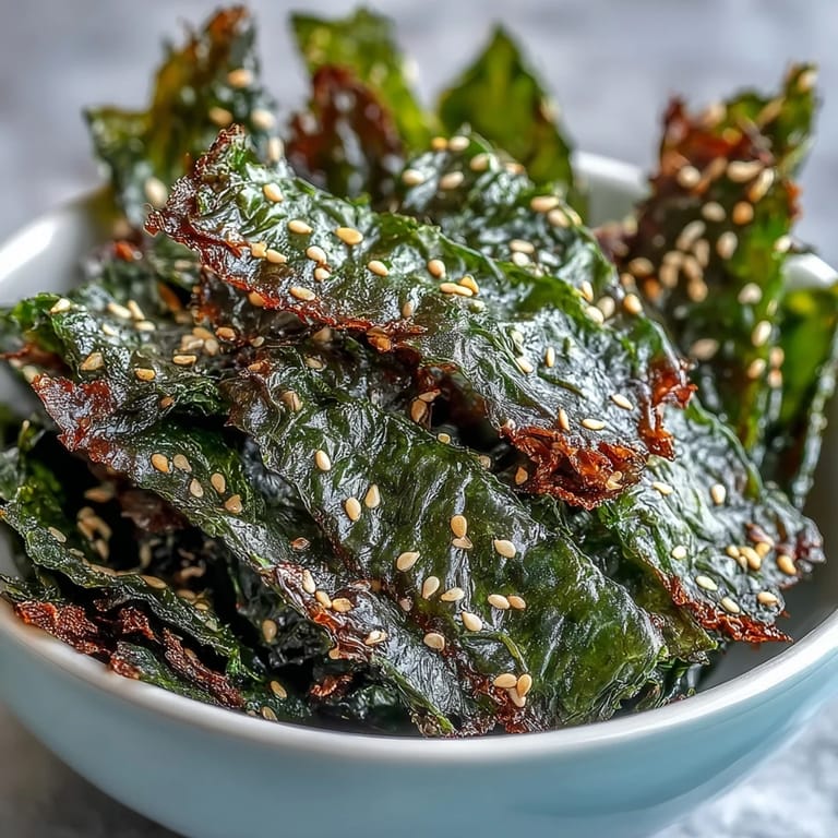 Golden seaweed snack chips, baked with toasted sesame and sea salt crunch.