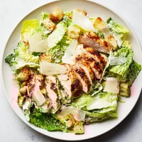 Fresh and flavorful Chicken Caesar Salad with grilled chicken, crisp romaine, and creamy dressing.